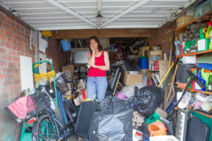 woman in her cluttered garage